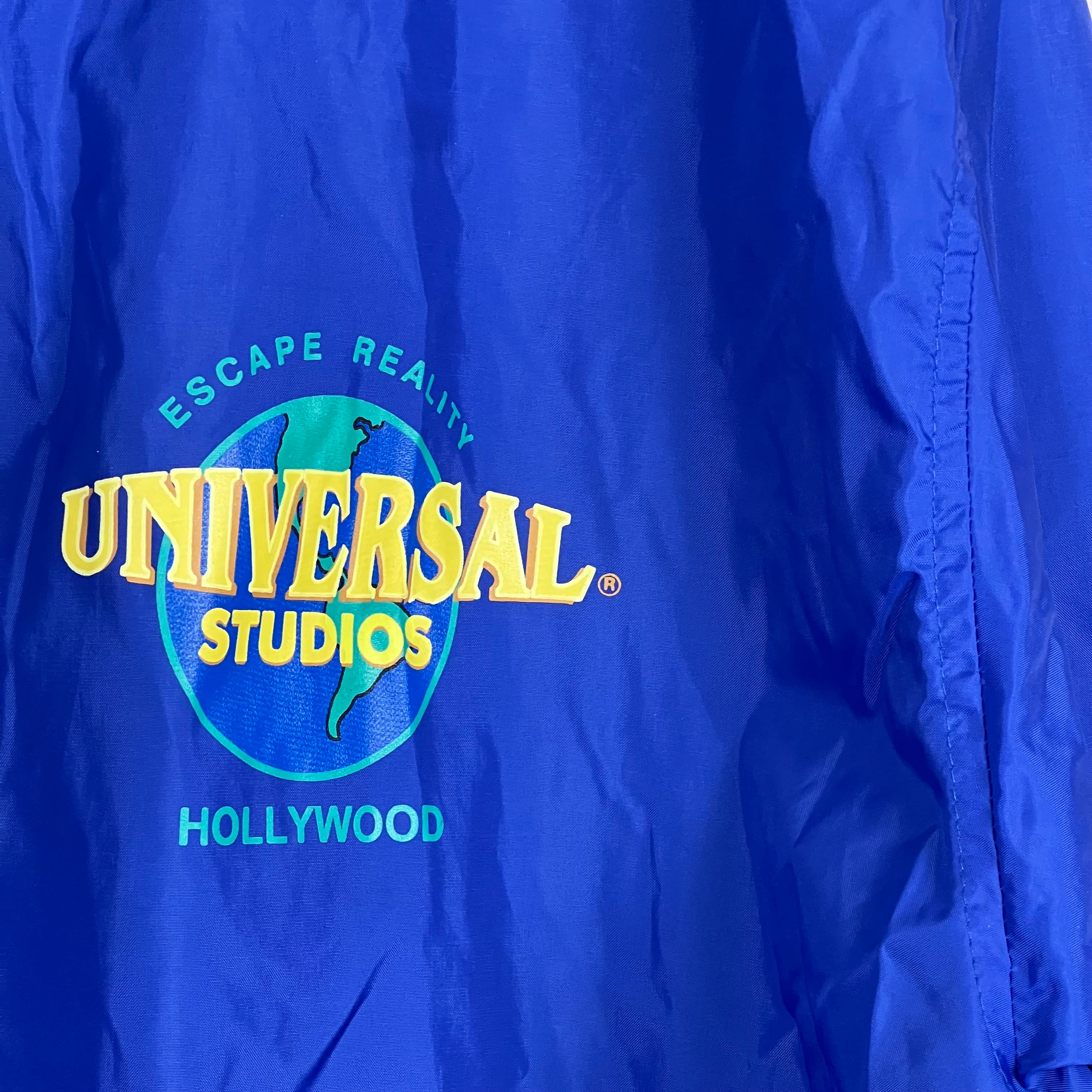 Vintage Universal Studios Hollywood “Escape Reality” Windbreaker Blue