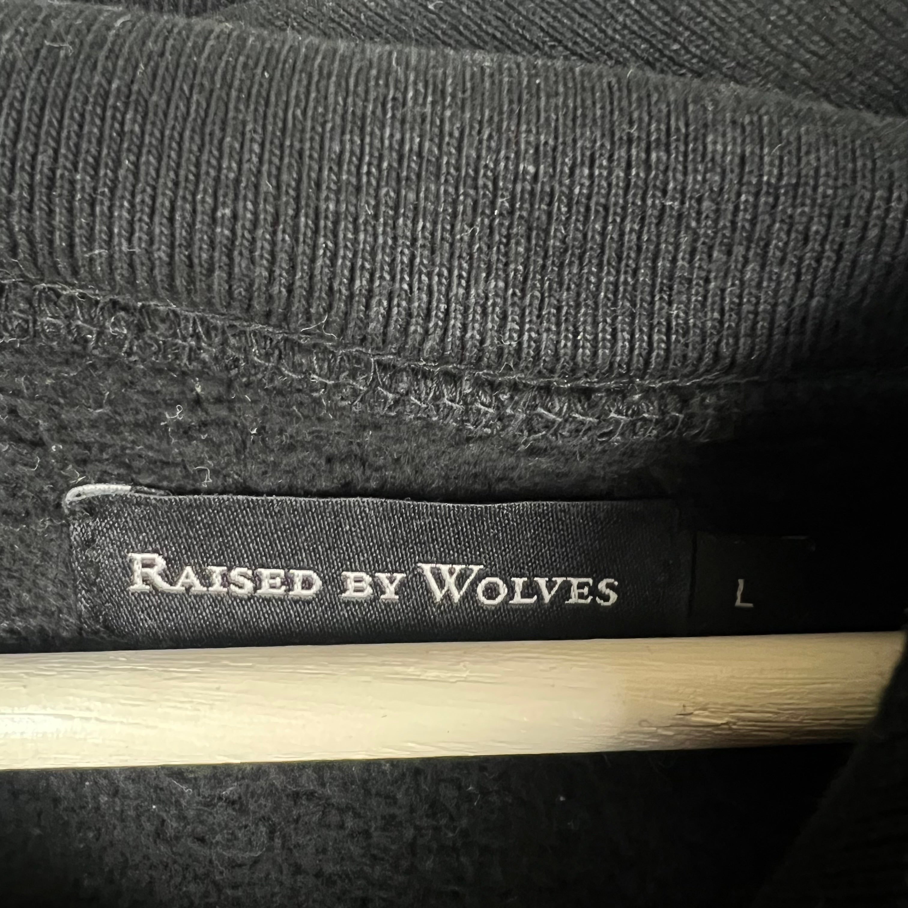 Raised By Wolves Spellout Logo Hoodie Black