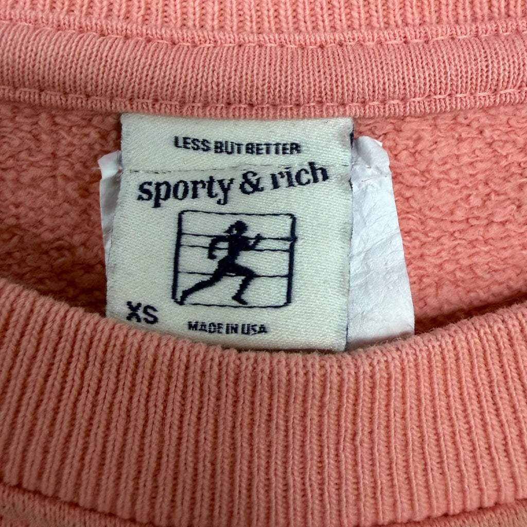 Sporty & Rich “Health & Wellness” Logo Crewneck Coral