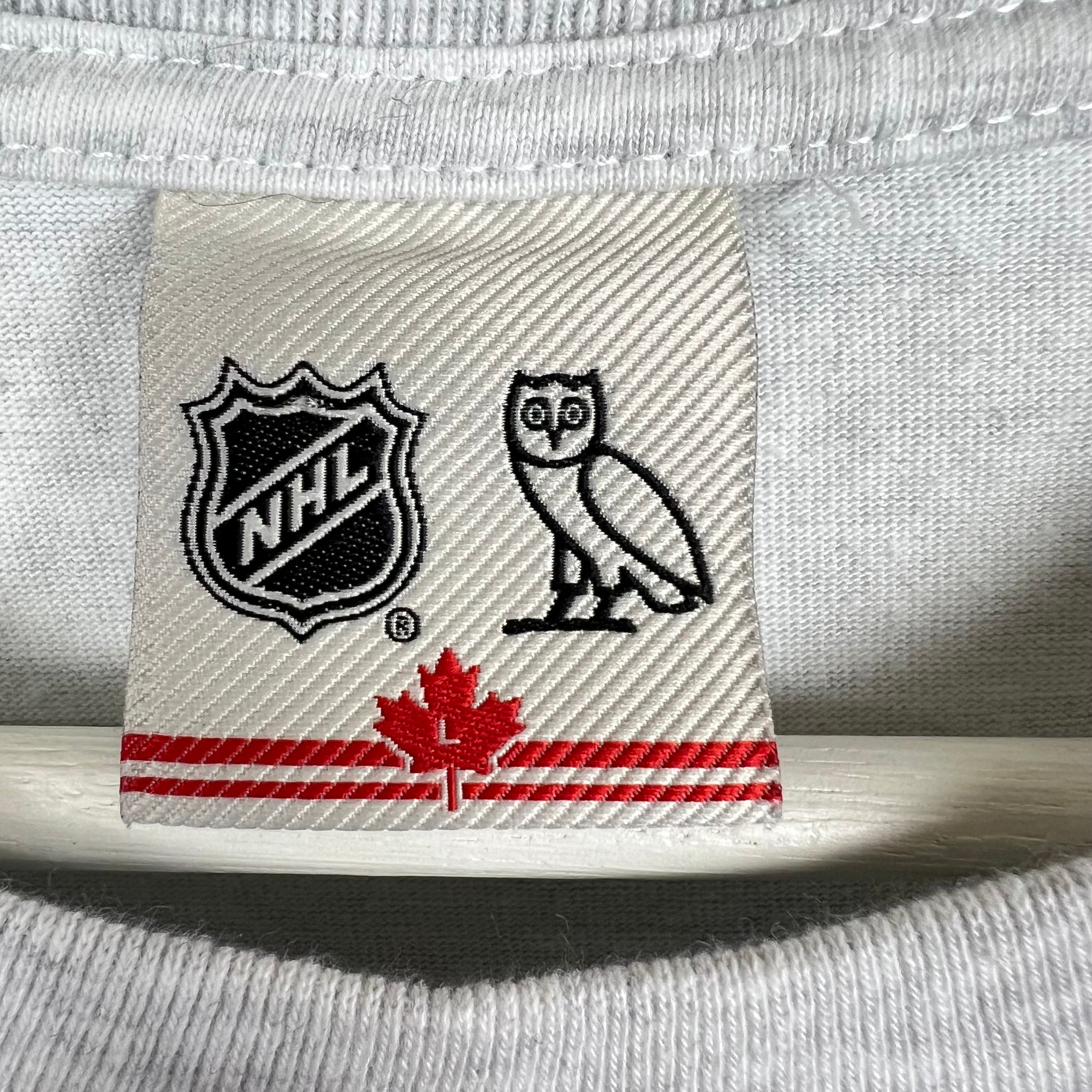 OVO x NHL Calgary Flames 90’s Graphic Tee Ash Heather Grey