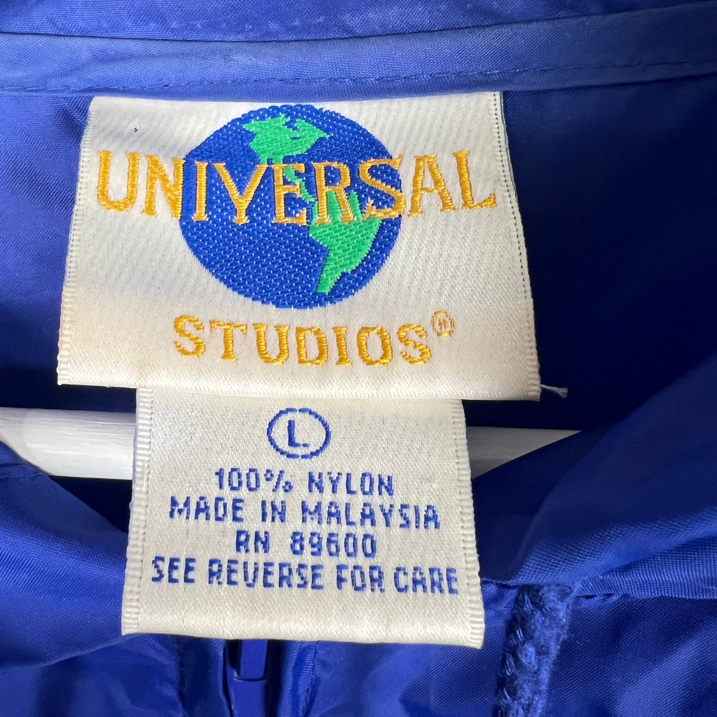 Vintage Universal Studios Hollywood “Escape Reality” Windbreaker Blue
